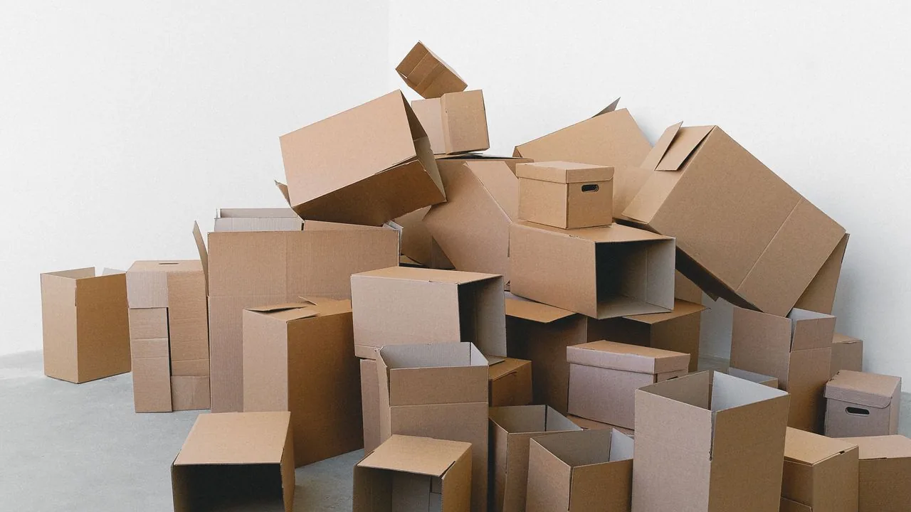 Moving boxes ready for a move-out cleaning in a Seattle apartment.
